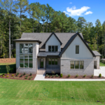 Custom home exterior at 2957 Wexford Pond Way in Wake Forest NC by Tobin Construction
